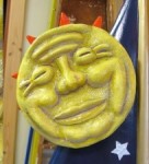 Painting the sun and moon sculptures