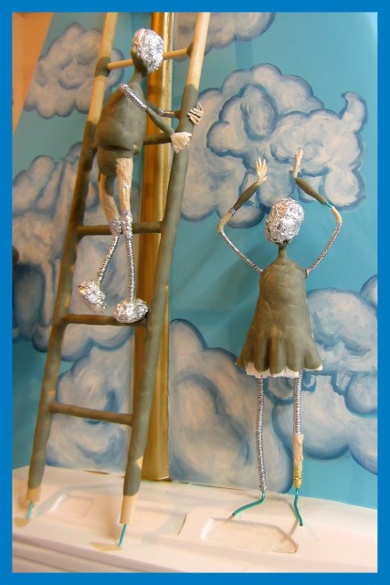 Ladder boy and paint girl sculpture
