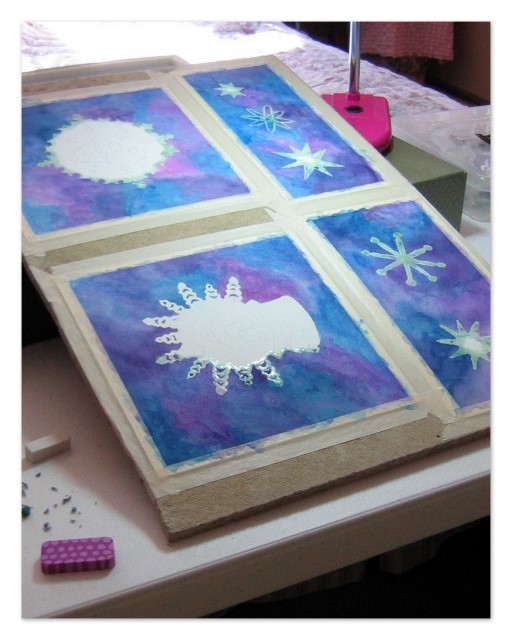 Snowflake designs at Christine's work table