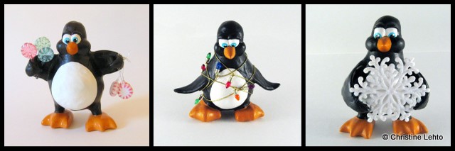Christmas Playful Penguin scultpures