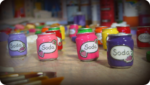 Mini soda cans in the painting and glazing studio