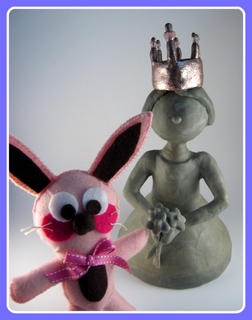 Ralphie the Bunny with the work-in-progress Glitter Queen sculpture